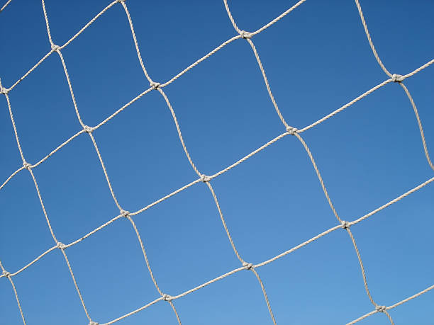 istock Soccer Net Against Blue Sky 115892556