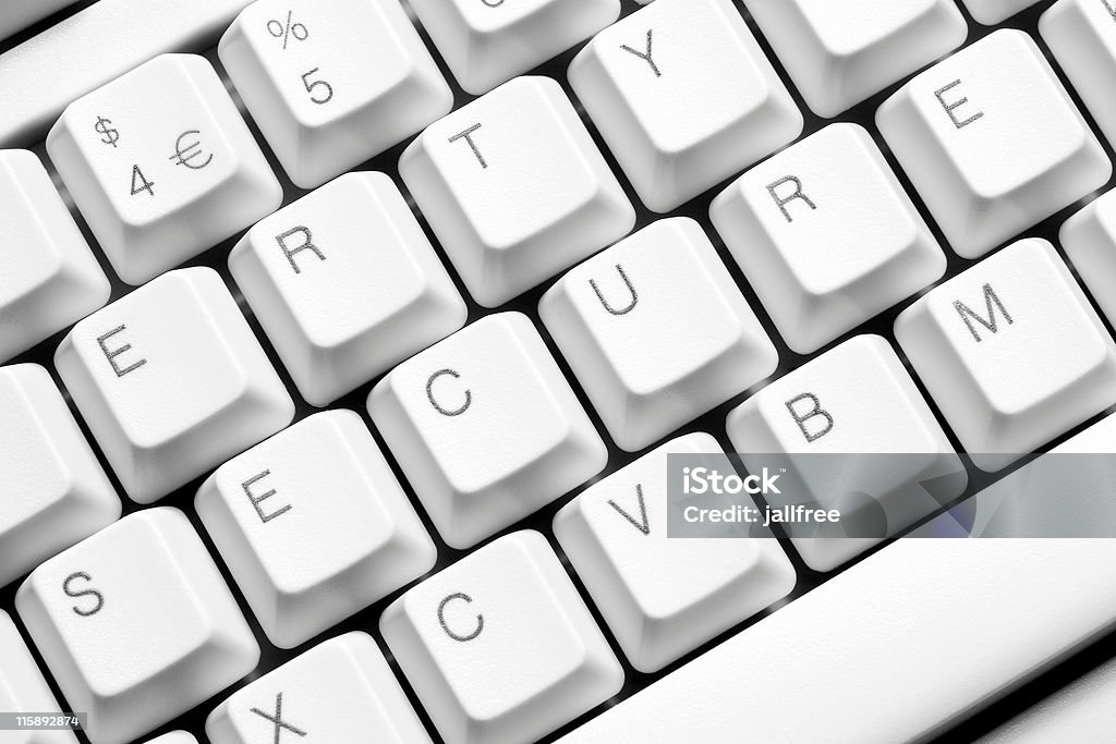 Zabezpieczyć zapisane w klawiszy na klawiaturze komputera biały - Zbiór zdjęć royalty-free (Bankowość)
