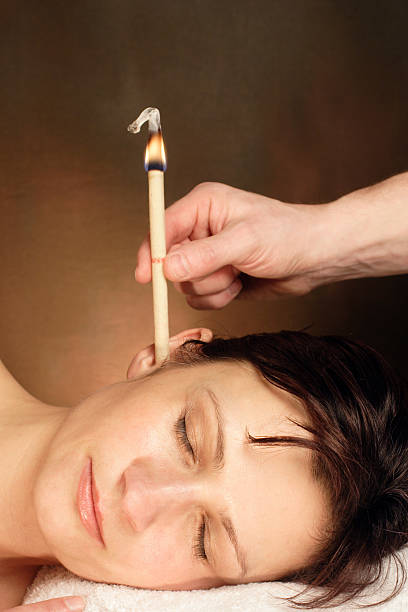 ear candling therapy ear candling therapy treatment hopi culture photos stock pictures, royalty-free photos & images