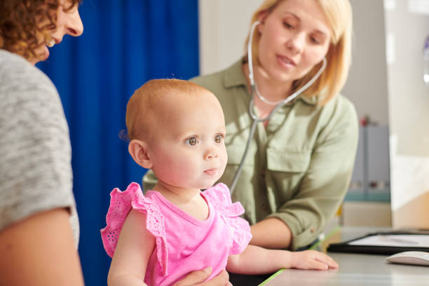 istock baby at the doctors 1158931920
