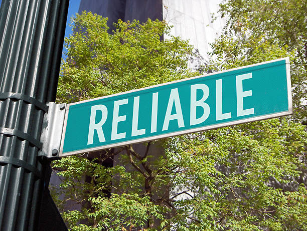 istock Green reliable street sign with trees behind 115894388