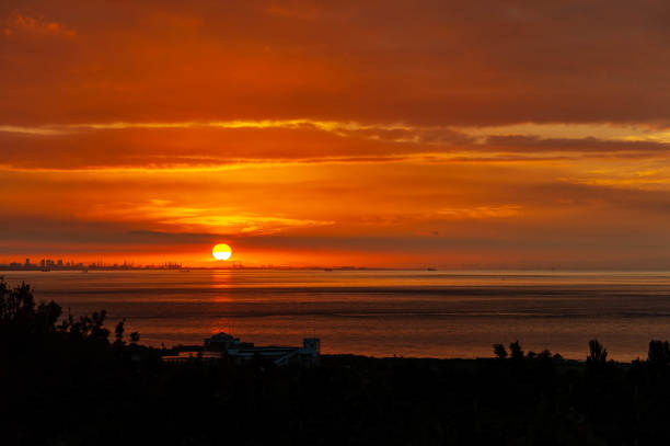 istock Awaji Island's bright red sunrise and sun 1158944451