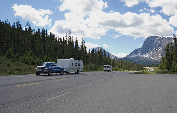 istock pickup with trailer having a good trip in the rockies 115894499