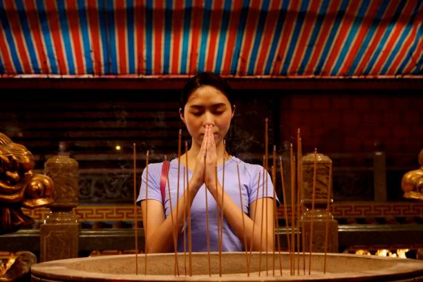 istock Young woman at temple 1158945290
