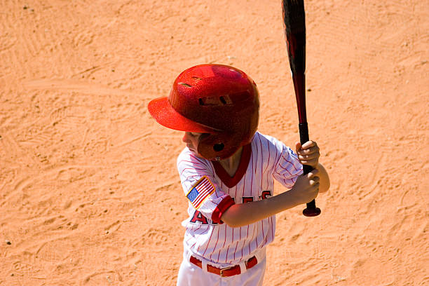 Baseball player ready to bat. Little league boy. Overhead view.