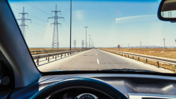 istock View from the car cab, driving on the highway 1158961378