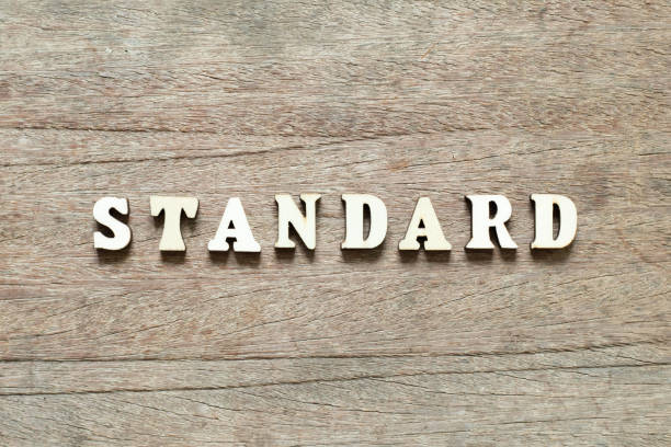 istock Letter block in word standard on wood background 1158966746