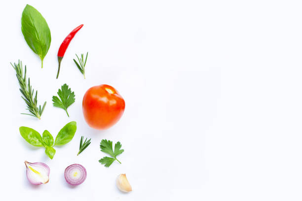 istock Various fresh vegetables and herbs on white background. Healthy eating concept 1158967616