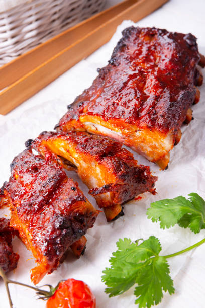 istock BBQ spare ribs from a charcoal grill 1158970096