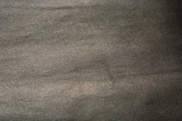 cuir nappa texturé gris a utilisé la texture pour l'arrière-plan. pour le fond textural avec des sièges d'auto - car leather hide seat photos et images de collection