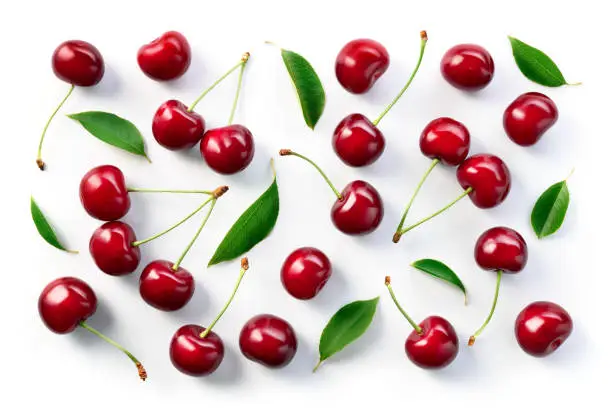 Cherry background. Cherries flat design. Cherry with leaves.