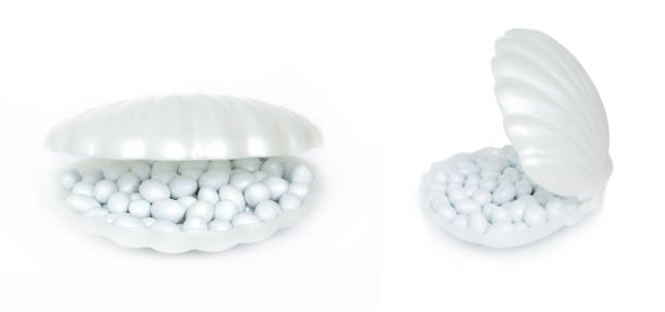 istock Packaging of round candies with nuts in the form of shell. two angles 1158975549