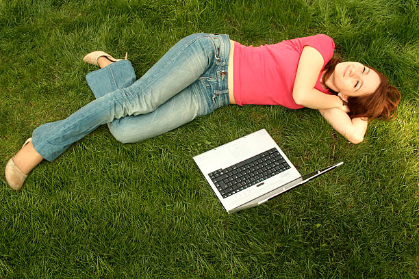 istock Student with laptop in the campus 115897627