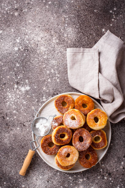 istock Homemade donuts with sugar powder 1158978198