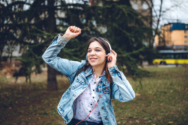 istock Listening to music downtown 1158978794