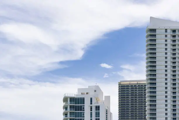 Photo of Beautiful view on Miami city, high buildings and blue sky with clouds prior to Irma hurricane. Travel destination, vacation season.