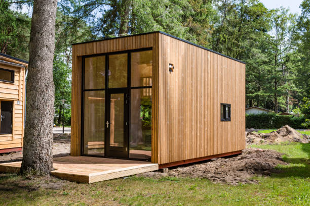 Dutch wooden tiny houses Beekbergen, Netherlands, June 21 2019: Wooden tiny house under construction. A new form of living philosophy to reduce ecological footprint dutch architecture stock pictures, royalty-free photos & images
