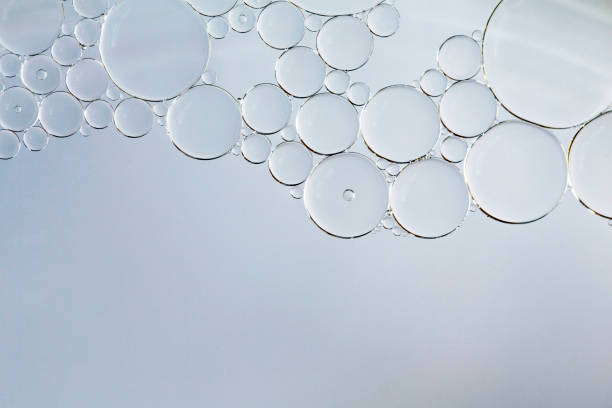 istock Water and oil bubbles - white soapy bubbles 1158984784