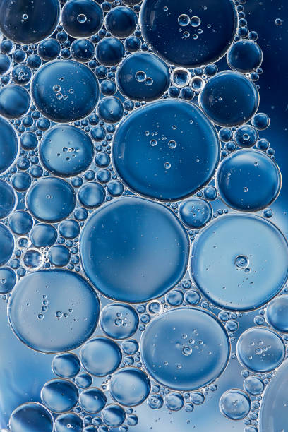 istock Water and oil bubbles - soapy blue bubbles 1158984889