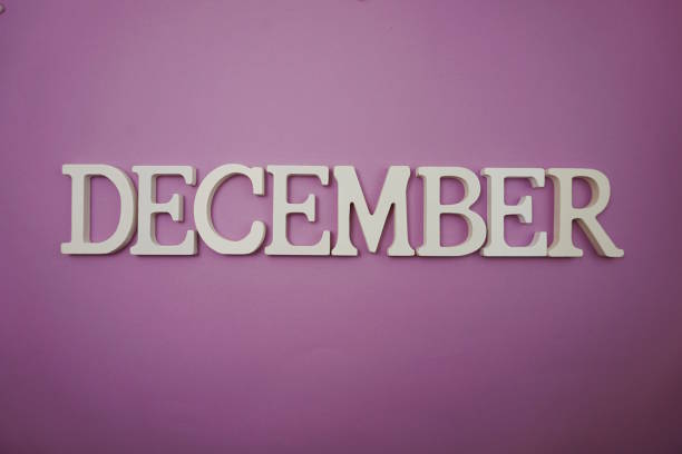 istock December alphabet letter with space copy on purple background 1158993439