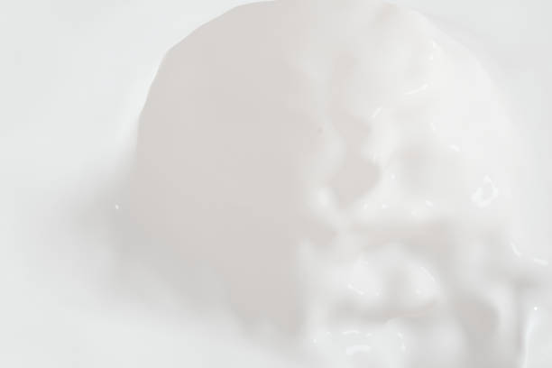 istock Purity splashing milk with creative shapes, 3d rendering. 1158995860
