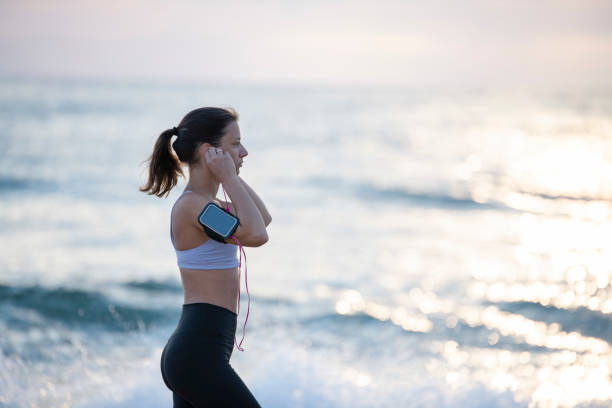 istock Sports woman preparing for running. 1158996059