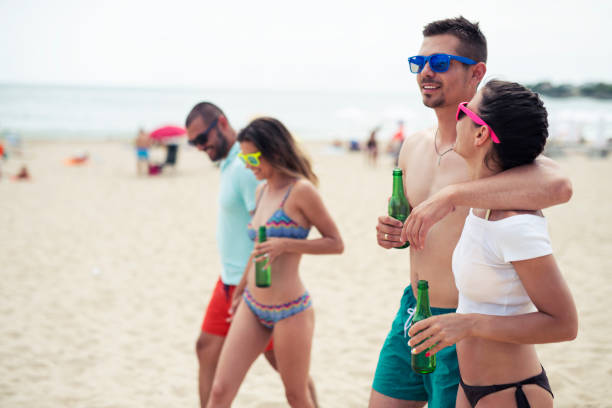 Cheerful People Enjoying On The Beach