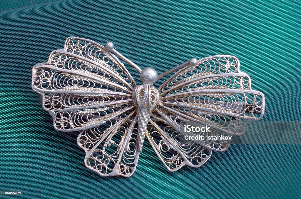 Farfalla brosh argento - Foto stock royalty-free di Oro - Metallo