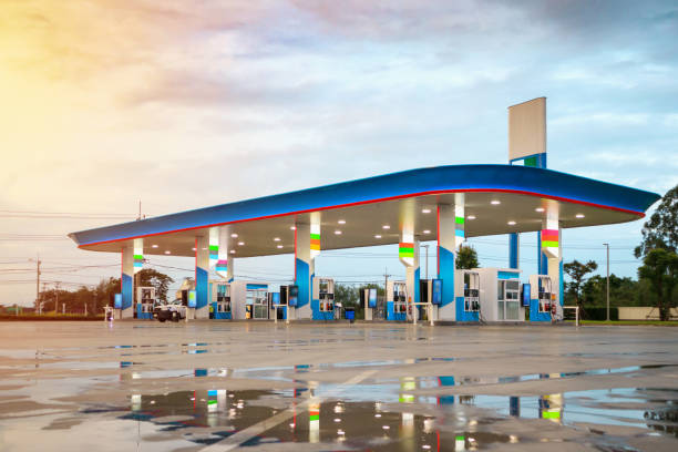 istock Gas fuel station with clouds and blue sky at sunset 1158997085