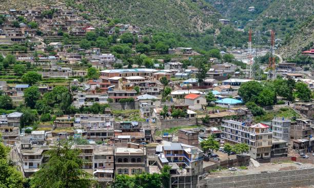 istock A small mountain town and glacial river 1158997128