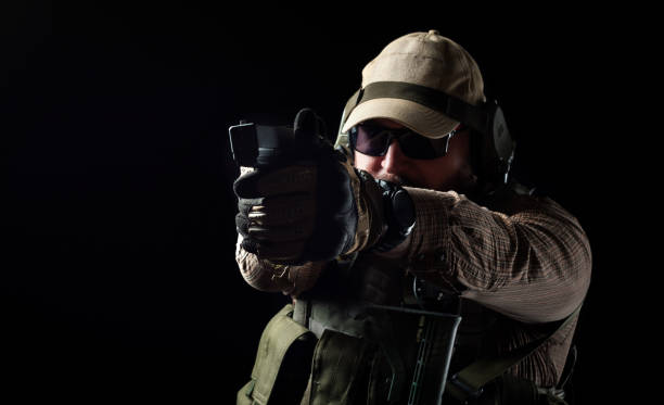 istock Armed soldier ready for battle. Military concept. 1159003764