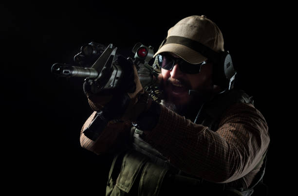 istock Armed soldier ready for battle. Military concept. 1159003773