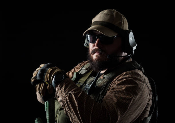 istock Armed soldier ready for battle. Military concept. 1159003830