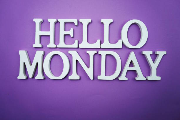 istock Hello Monday wooden letter alphabet on purple background 1159004027
