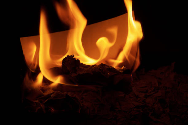 istock Burning edge of paper 1159008968
