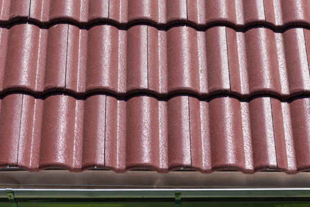 istock Closeup red roof tile with gutter detail 1159010572