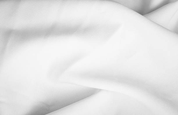 istock Background wrinkled fabric white texture detail 1159010591