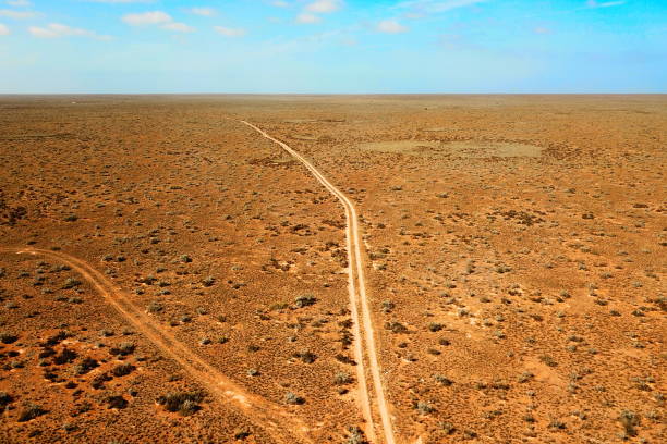 istock Tracks across Australian desert 1159011479