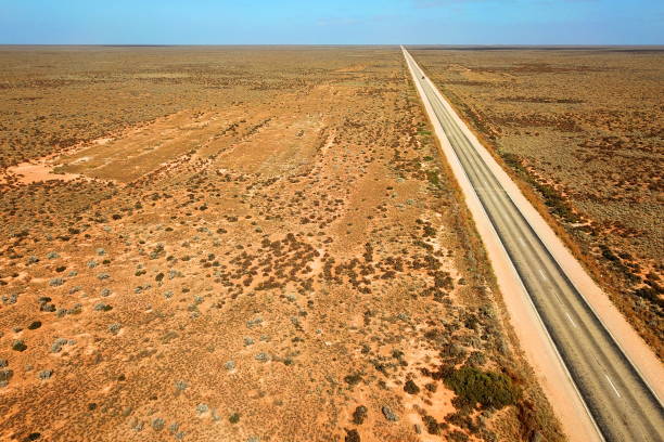 istock Tracks across Australian desert 1159011689