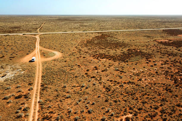 istock Tracks across Australian desert 1159012634
