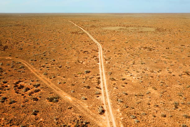 istock Tracks across Australian desert 1159012725