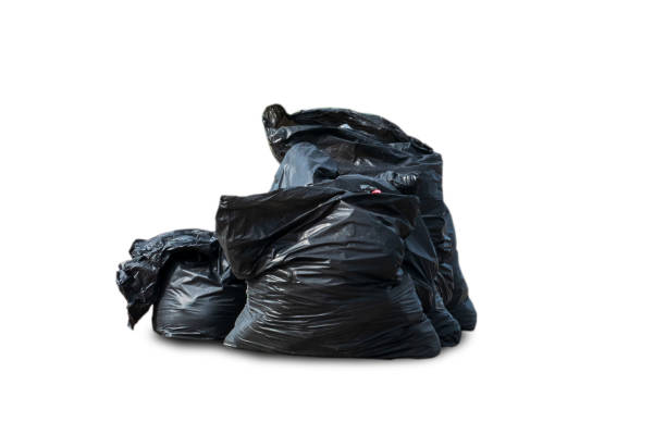 istock Black plastic garbage bags separated from the background clipping part 1159013742