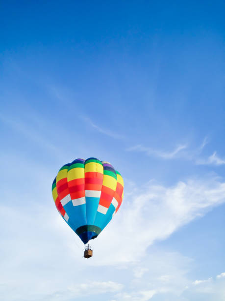 istock Hot air balloon with blue sky background with copyspace 1159016394