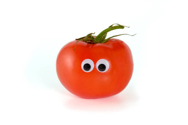istock Googly eyes. Funny cute red mister Fresh Tomato, isolated on white background. 1159016432