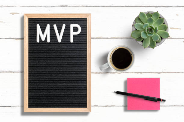 MVP written on letter board next to sticky note, coffee and a succulent plant MVP written on letter board next to sticky note, coffee and a succulent plant on white painted wooden background most valuable player stock pictures, royalty-free photos & images