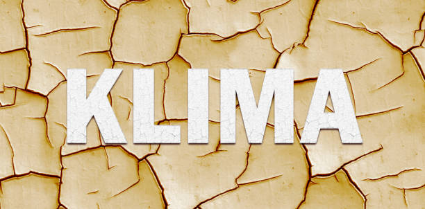 istock Climate change banner with lettering over dry mud 1159016539