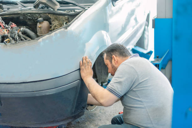 Repairman in car service