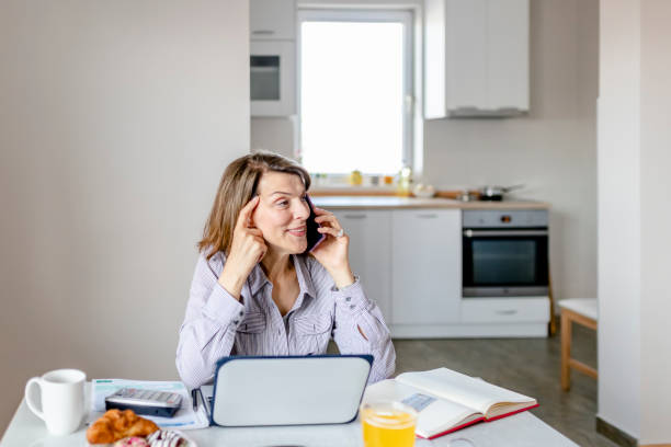 istock Woman Talking on Smartphone 1159021328