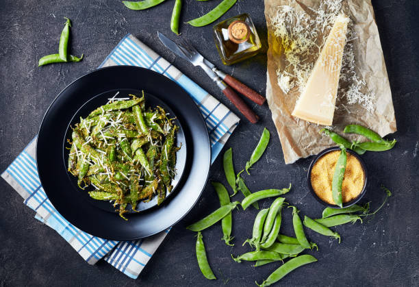 istock Crunchy baked Parmesan Sugar Snap Peas 1159025901