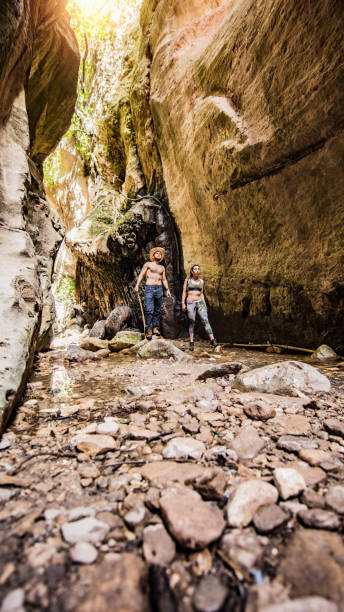 istock Hipster couple exploring a beautiful canyon on Cyprus island. 1159026070